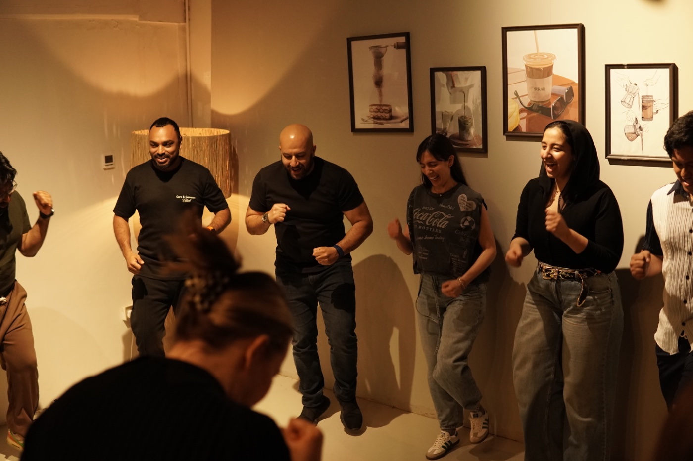 The crew dancing together